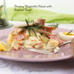 creamy vegetable salad with smoked trout