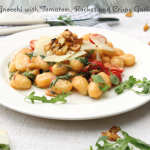 gnocchi with tomatoes, rocket and garlic