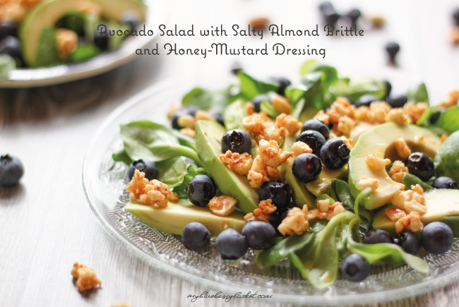 Avocado salad with salty almond brittle and honey-mustard dressing