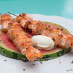 Grilled watermelon with salmon skewers