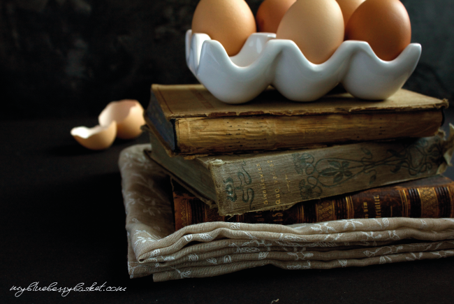 photo of eggs on a pile of books