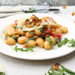 Foto von Gnocchi mit Tomaten und Rucola